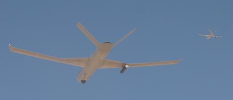 Two General Atomics MQ-20 Avengers fly collaborative unmanned aircraft teaming experiments during Edwards Air Force Base’s Orange Flag 21-3 c General Atomics