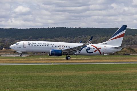 Rex_Airlines_(VH-RQC)_Boeing_737-8FE(WL)_landing_at_Canberra_Airport_(6)