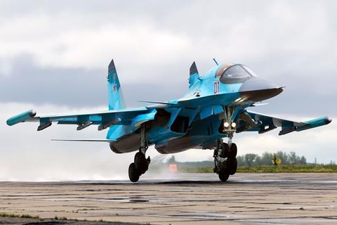 Russian Su-34 fighter-bomber crashes into residential apartment ...