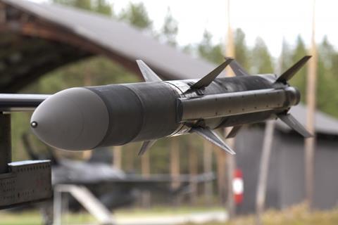 AIM-120 on missile launch rail c Raytheon