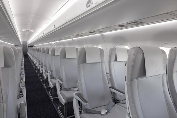 Finnair shows off revamped E190 cabin interiors | Flight Global